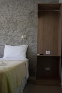 Postel nebo postele na pokoji v ubytování Anhembi Hostel