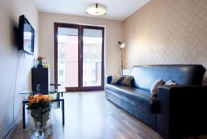 Кът за сядане в Cracow Stay Apartments