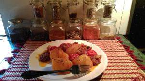 a plate of food with a fork and jars of jam at The Seven Sisters Farm in Kodaikānāl