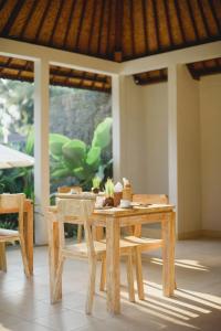 Restoran atau tempat lain untuk makan di Taman Amartha Hotel