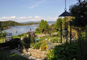 a view of a river with boats in the water at The Moorings in Tarbert