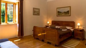 Postel nebo postele na pokoji v ubytování Gorska kuća Elin