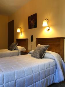 Posteľ alebo postele v izbe v ubytovaní Hotel La Bonaigua