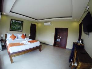 Postel nebo postele na pokoji v ubytování Cahyatika Bed & Breakfast