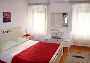 Postel nebo postele na pokoji v ubytování Apartments & Rooms Nada