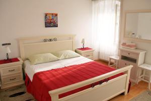 Postel nebo postele na pokoji v ubytování Apartments & Rooms Nada