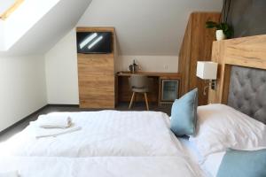 Postel nebo postele na pokoji v ubytování Hotel Diana