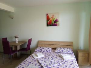 Postel nebo postele na pokoji v ubytování Apartments M&Z