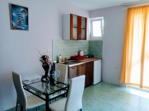 Kuchyň nebo kuchyňský kout v ubytování Apartments M&Z