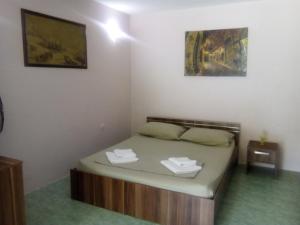 Postel nebo postele na pokoji v ubytování Apartments M&Z