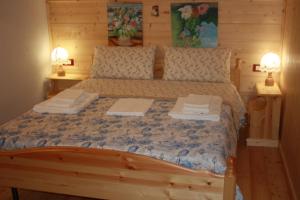 Albergo Diffuso Fallerにあるベッド