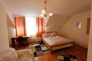 Postel nebo postele na pokoji v ubytování Hotel Adria Stuben