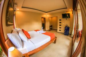 Postel nebo postele na pokoji v ubytování Cahyatika Bed & Breakfast