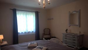 Postel nebo postele na pokoji v ubytování B&B Le Nid Doux (Vresse-Sur-Semois/Chairière)