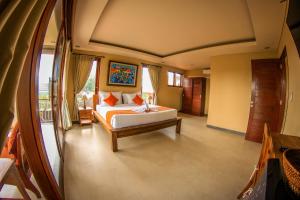 Postel nebo postele na pokoji v ubytování Cahyatika Bed & Breakfast