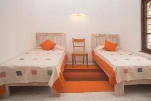 Postel nebo postele na pokoji v ubytování Dolce Italia Rooms