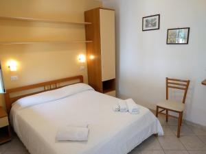 Residence Giardino del Sole客房内的一张或多张床位