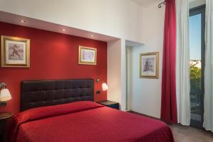 Postel nebo postele na pokoji v ubytování Hotel Kursaal & Ausonia
