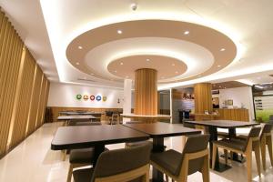 Restoran või mõni muu söögikoht majutusasutuses Garden Spring Hotel