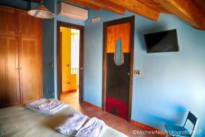 Cama ou camas em um quarto em La Casa di Ivana