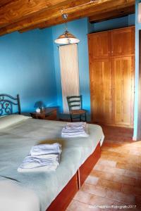 Cama ou camas em um quarto em La Casa di Ivana
