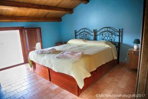 Cama ou camas em um quarto em La Casa di Ivana