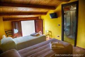 Cama ou camas em um quarto em La Casa di Ivana