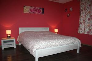 Letto o letti in una camera di Gite Au Cortil