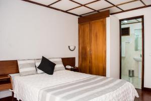 Letto o letti in una camera di Aparthotel Avenida
