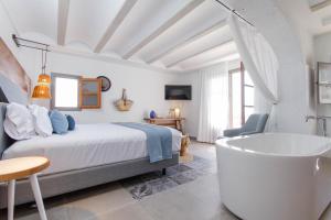 Cama ou camas em um quarto em La Serena Boutique Hotel & Wellness - Altea