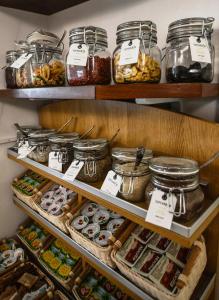 a pantry filled with lots of different types of food at Hotel Zani in Cervia +38 photos