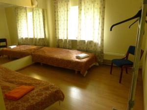 Postel nebo postele na pokoji v ubytování Viva Pirita Hostel
