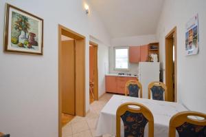 Kuchyň nebo kuchyňský kout v ubytování Apartmani Meri