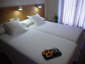 Postel nebo postele na pokoji v ubytování Littore TORMES con Parking, AA y Piscina + 18 fotografií