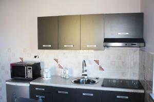 Kuchyň nebo kuchyňský kout v ubytování Apartment Marko