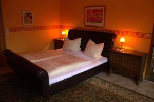 Postel nebo postele na pokoji v ubytování Landhaus Tewel