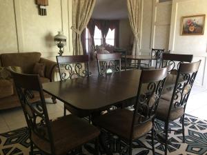 a dining room with a table and chairs at Shady Lady Bed and Breakfast in Scottys Junction