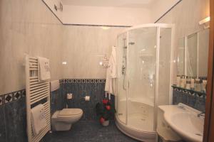 Koupelna v ubytování Hotel Villa Luca