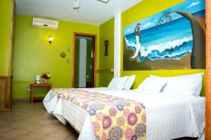 Voodi või voodid majutusasutuse Hotel Maya Vista toas