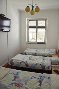 Cama o camas de una habitación en Old Square Bihać