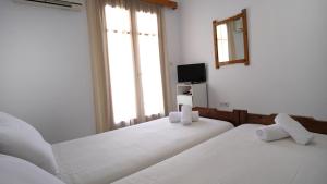 Postel nebo postele na pokoji v ubytování Constantine Fortezza Rooms