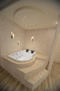 Koupelna v ubytování Hotel Elesio