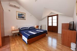 Postel nebo postele na pokoji v ubytování Apartment House Senna