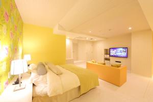 Кровать или кровати в номере Hotel Water Gate Hamamatsu (Adult Only)