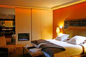 Кровать или кровати в номере Gran Hotel Nagari Boutique & Spa