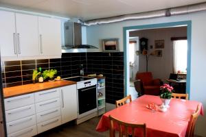 Kjøkken eller kjøkkenkrok på Cape East Homestay
