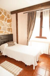 Кровать или кровати в номере Tejas Verdes
