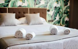 Posteľ alebo postele v izbe v ubytovaní Málaga Premium Hotel