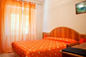 Postel nebo postele na pokoji v ubytování B&B Il Colle