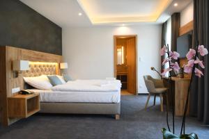 Postel nebo postele na pokoji v ubytování Hotel Diana